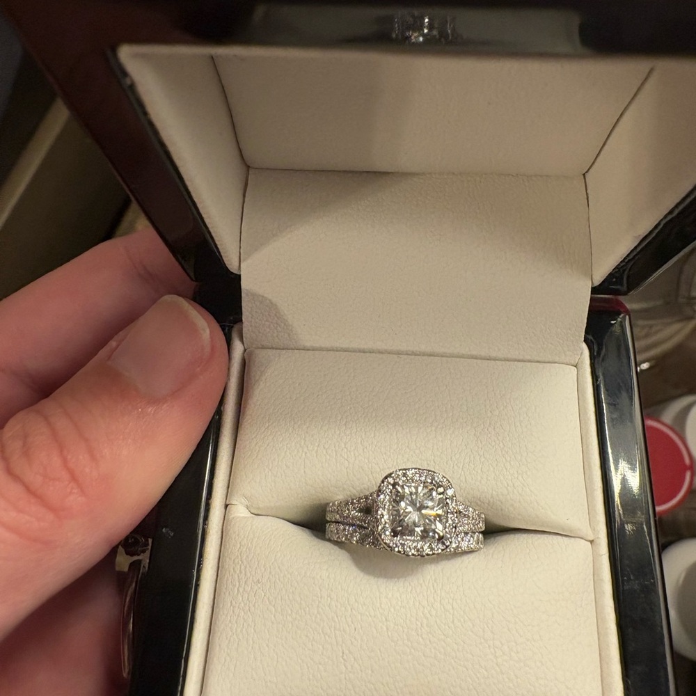 Cushion cut diamond ring with halo and wedding band. White gold